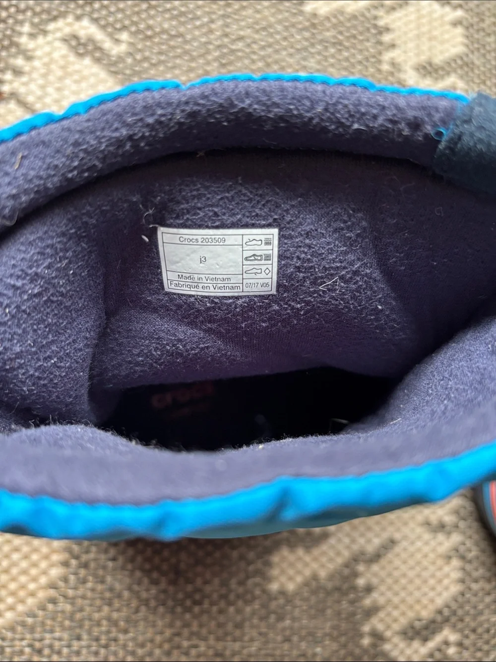 CROCS Kids Navy and Bright Blue Winter Boots with Orange Toggles